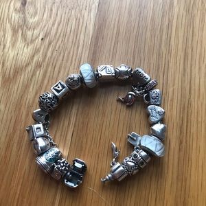 Authentic Pandora bracelet. Full of charms